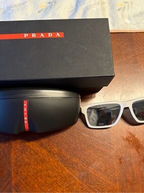Prada White Frame Sunglasses with Dark Lenses